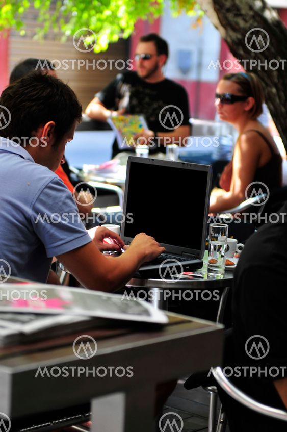 picture of handsome businessman on leisure with laptop