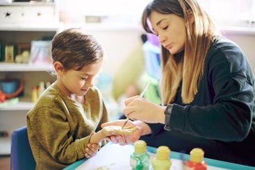 Education, painting or art with a mother and son in a...