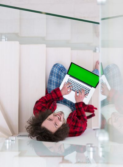 freelancer in bathrobe working from home