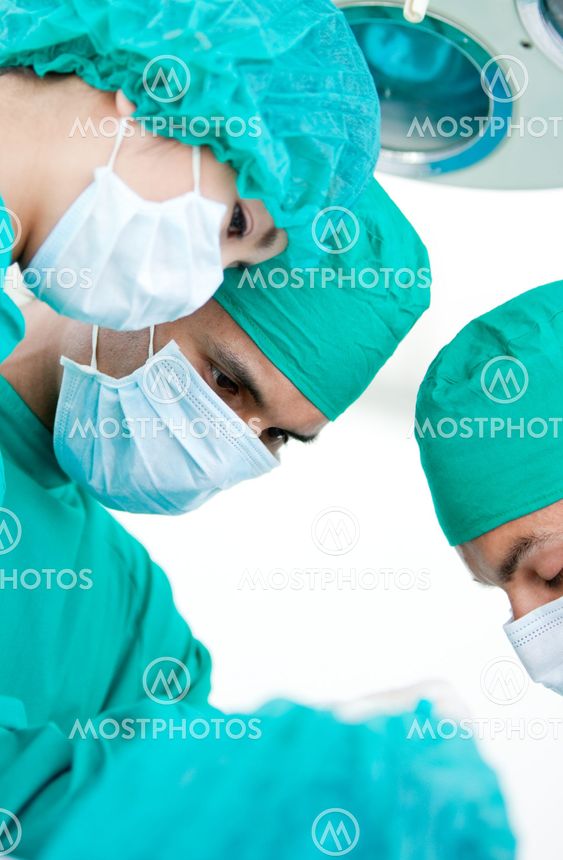 Medical partners looking at the patient