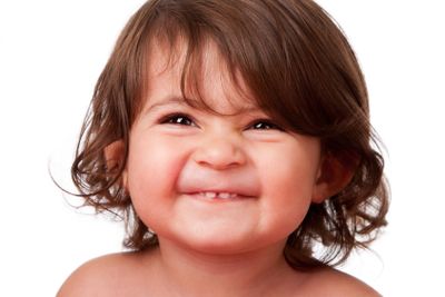 Funny happy baby toddler face