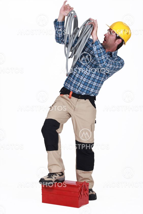 Electrician swamped with cables