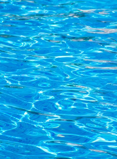 Bright blue water in a pool