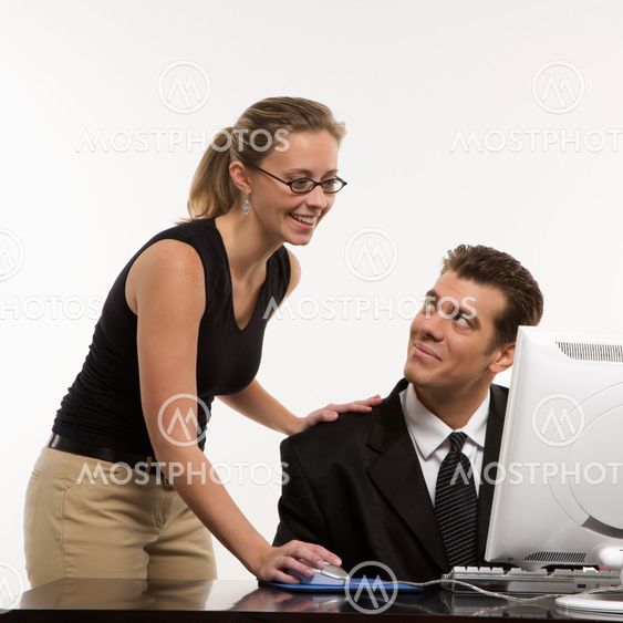 Working on computer.