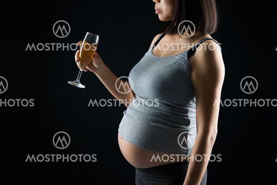 pregnant mother drinking