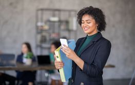 Business professionals collaborate in a dynamic office...