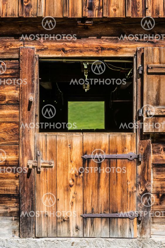Wooden door of stable