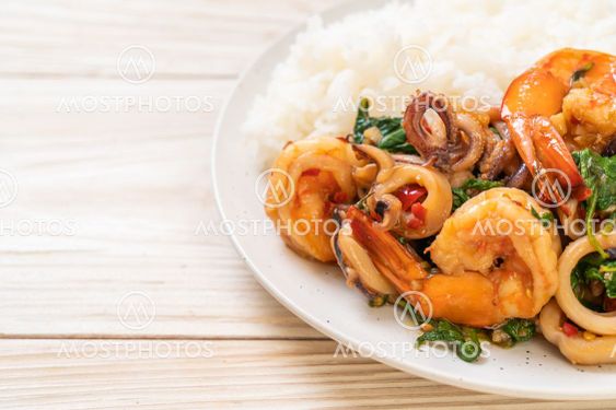 rice and stir-fried seafood with Thai basil