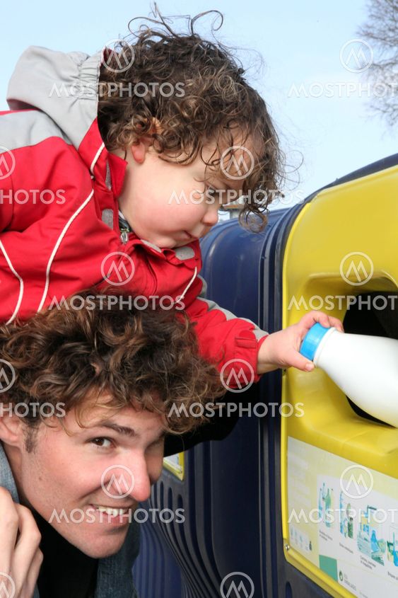 Father and son recycling