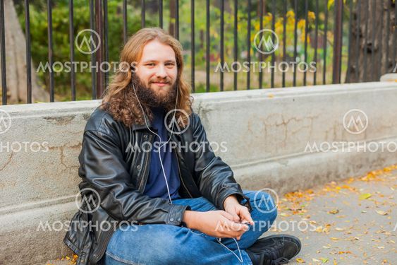 Blond Beard Young Adult Hipster Man Listening Music
