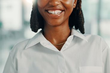 Business, smile and teeth of black woman closeup in...