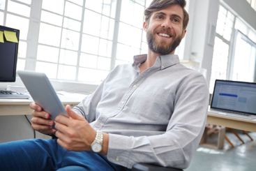 Man, thinking and worker with tablet in agency, event...