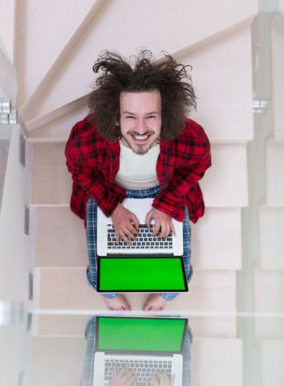 freelancer in bathrobe working from home