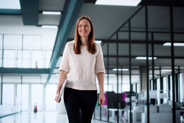 Creative Businesswoman Collaborating with Team