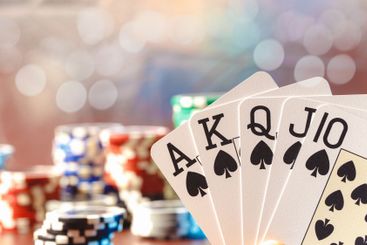 Poker game set of cards and chips close up