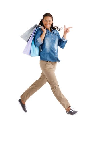 Jumping, portrait and shopping with woman customer in...