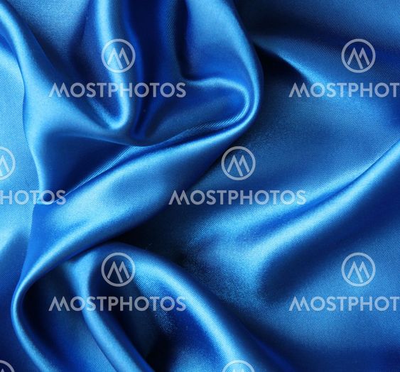 Smooth elegant blue silk as background