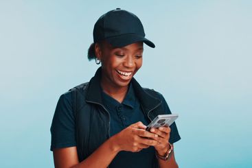 Black woman, phone and happy in smile for delivery,...