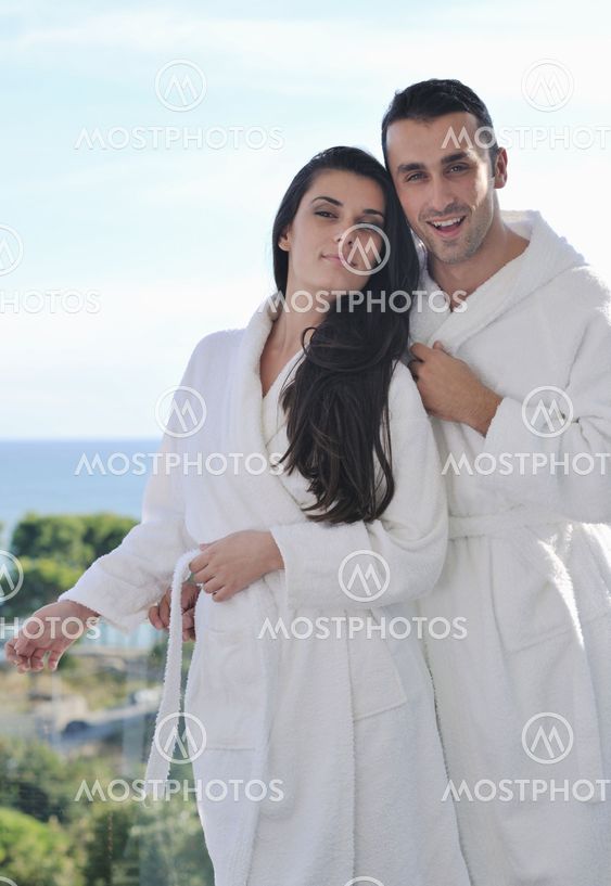 couple relaxing on balcony