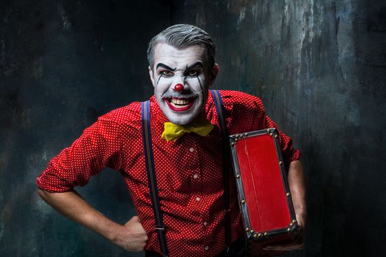 Terrible crazy clown and Halloween theme