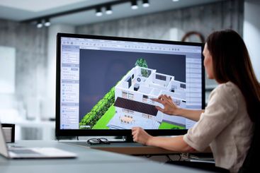 Female architect using 3D software
