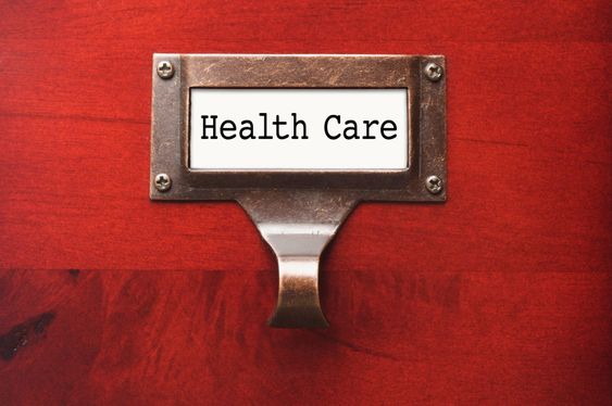 Lustrous Wooden Cabinet with Health Care File Label