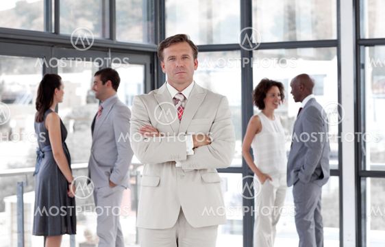 portrait of a male manager leading his team