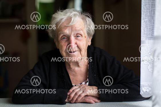 An elderly woman, closeup portrait.