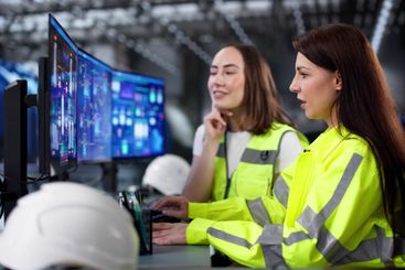 Female engineer monitors control screen