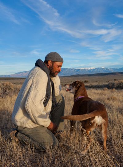 Man playing with his dog