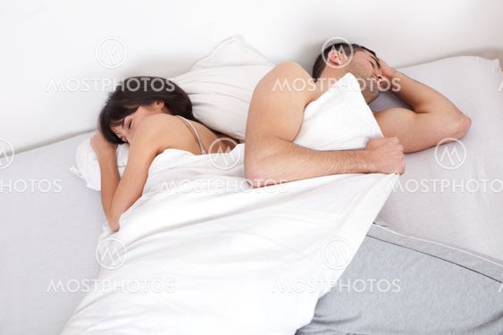 Lovely young couple sleeping