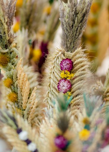 Traditional Lithuanian Easter palms known as verbos sold...