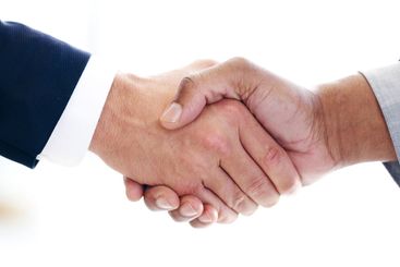 Closeup, business people and handshake in office, thank...