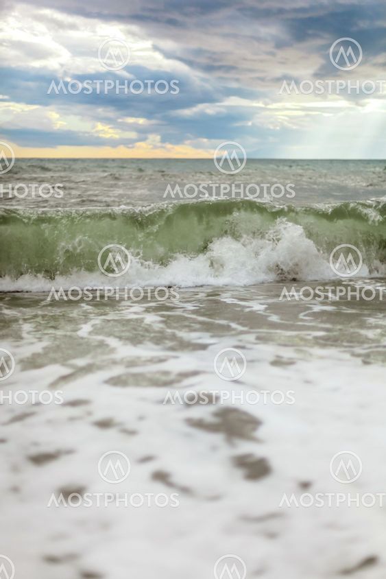 Sea or ocean cloudy sky wave after storm. Space for text.