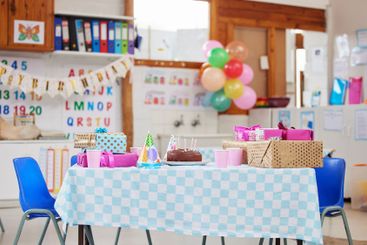 Empty classroom, celebration and birthday party at...