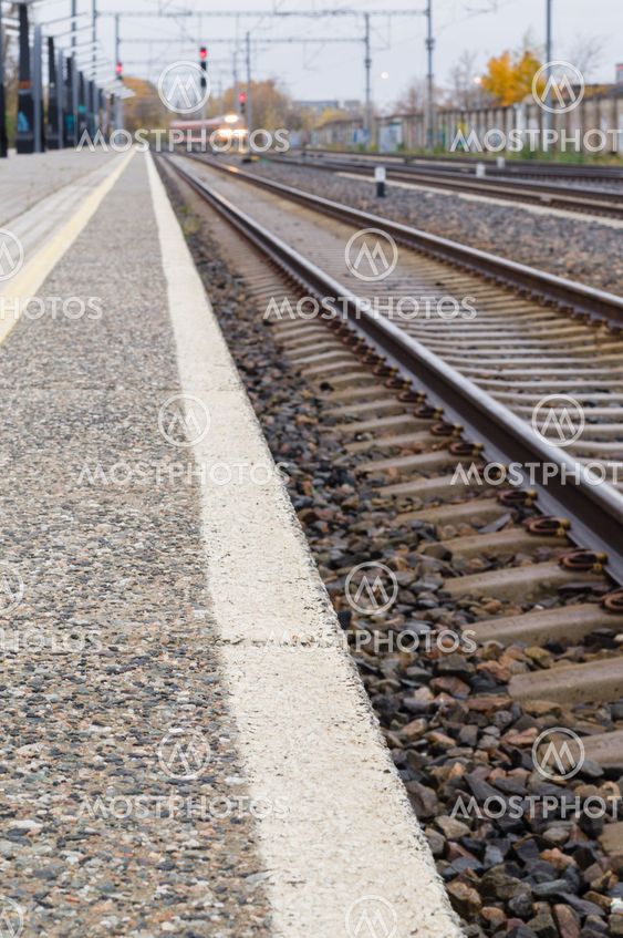Railroad track, platform and train