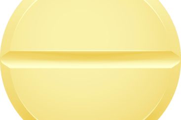 Yellow round medicine pill featuring a score line...