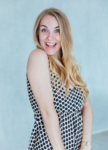 Beautiful fashion blonde woman smiling in summer light...