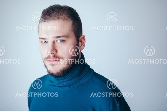 Portrait of a handsome bearded young man