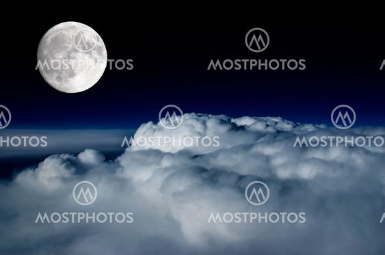Full moon above cloud deck