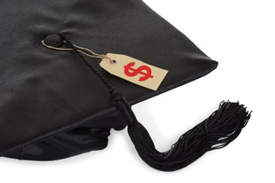 Black Graduation Cap With Tassel And Price Tag