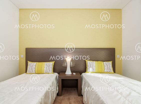 Cozy bedroom in shades of yellow.