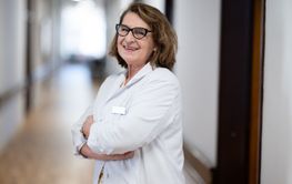 An experienced and confident elderly female doctor,...