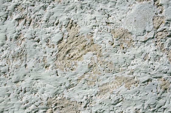Weathered limewashed wall
