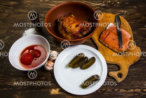 Still Life With grilled meat of turkey and salt salmon...