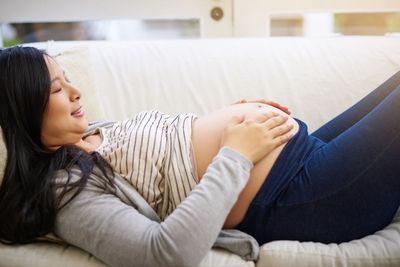 Waiting patiently for her little one. an attractive...