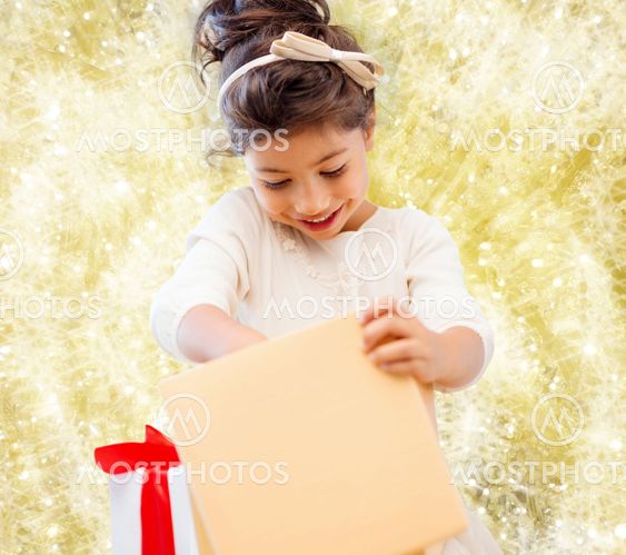 smiling little girl with gift box