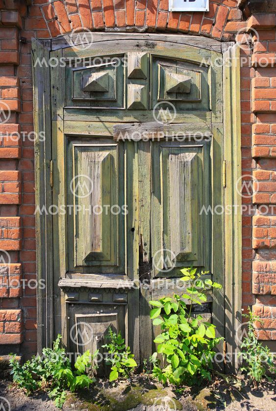 old wooden arch door