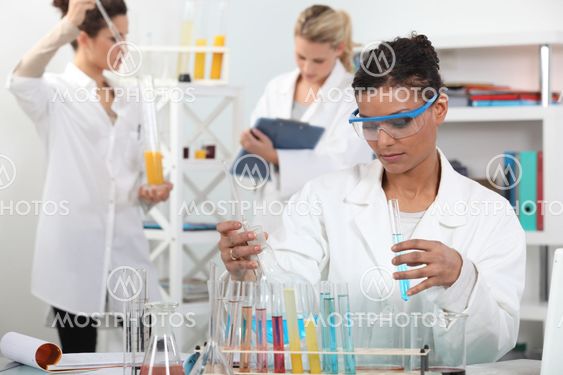 Women conducting an experiment