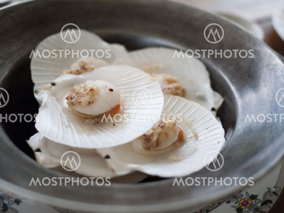 Baked scallops with butter. Thai style